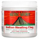  Ein großer weißer Behälter mit Aztec Secret Indian Healing Clay (Indische Heilerde), als „WELTWEIT LEISTUNGSFÄHIGSTE GESICHTSMASKE“ zur Tiefenreinigung gekennzeichnet, enthaltend 100% Natürlichen Kalzium-Bentonit-Ton, mit einer Grafik einer Azteken-Pyramide auf rotem Hintergrund.