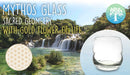  Ein Werbebild für "MYTHOS GLASS", das ein klares Glas mit dem Symbol der Goldenen Blume des Lebens zeigt, überlagert auf einem lebhaften Foto eines großen Wasserfalls mit üppigem grünen Laub.