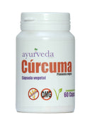 Eine weiße Plastikflasche mit Klappdeckel, beschriftet mit "ayurveda autentico Cúrcuma" mit "Pimienta negra" (schwarzer Pfeffer) und "Cápsula vegetal" (pflanzliche Kapsel). Es sind auch "Sin Gluten" (glutenfrei), "OMG" (gentechnikfrei) und "60 Cápsulas" (60 Kapseln) angegeben.