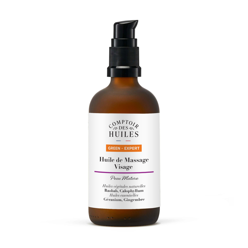 Eine bernsteinfarbene Glasflasche "Comptoir des Huiles Huile de Massage Visage" mit einem schwarzen Pumpspender. Die Beschriftung nennt sie ein "Green Expert" Produkt für reife Haut.