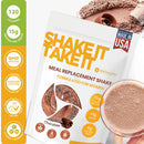 Eine Packung "Shake It Take It" Mahlzeitenersatz-Shake mit Schokoladengeschmack, zertifiziert mit 120 Kalorien, 15g Protein, GMP, Kosher, dermatologisch getestet und vitaminreich, neben einem angerührten Schokoladengetränk.