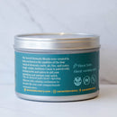 Die Rückseite der Cacao Laboratory AIR Ceremonial Grade Cacao Dose auf einer weißen Marmoroberfläche. Das petrol/blaue Etikett beschreibt die Sacred Elements Blends, spezifiziert die „AIR“-Mischung mit Hibiskus und Kardamom für mitfühlende Kommunikation und listet die Geschmacksnoten als „Floral, warming spice“ auf.