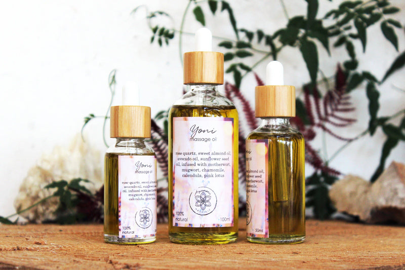 Yoni massage oil with rose quartz and herbs