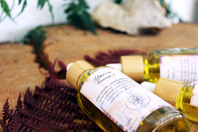 Yoni massage oil with rose quartz and herbs