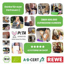 Eine Collage aus Kundenbildern und Testimonials, die die Zufriedenheit mit myvial-Produkten zeigen, mit hervorgehobenen Metriken wie "Über 600.000 zufriedene Kunden" und einer 4,9-Sterne-Bewertung, zusammen mit PETA-Approved, Bio- und AB-Cert-Zertifizierungen.