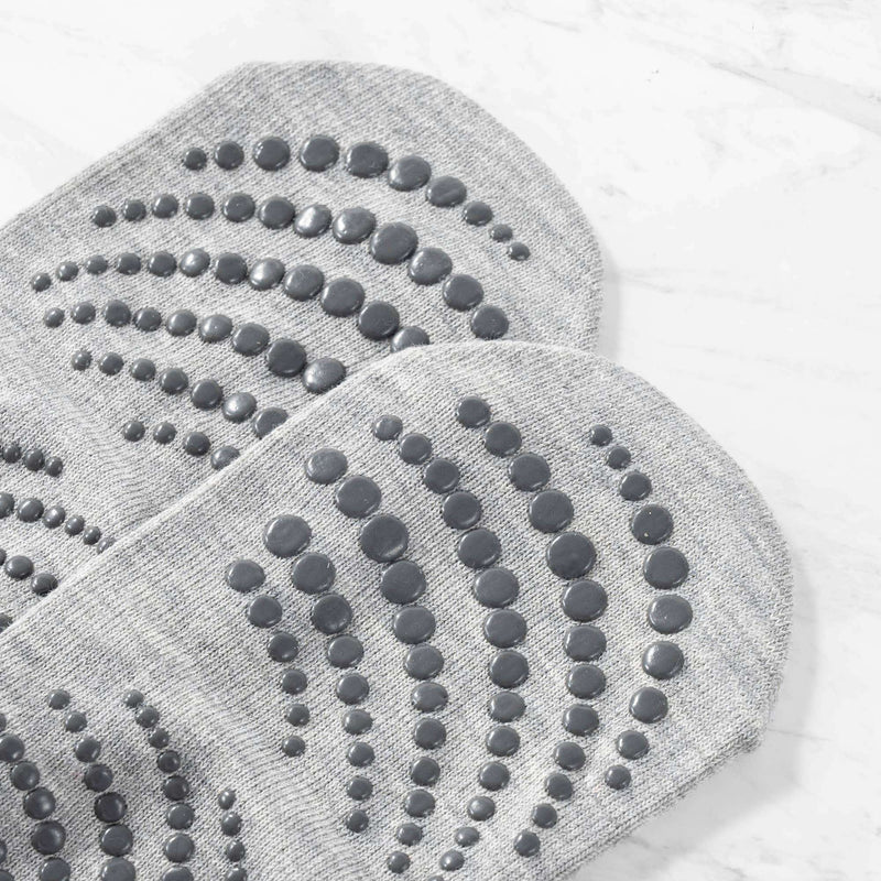 Chaussettes de yoga dos nu avec bretelles croisées et poignées — antidérapantes