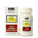Eine weiße Schachtel und eine weiße Plastikflasche mit NIMI AYURVEDA Amla-Kapseln. Das Etikett zeigt eine Gruppe von Amla-Früchten, den Inhalt von 60 Kapseln und das Gewicht von 35,8 g.