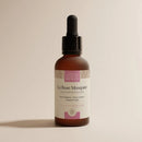 Braunes Glasläschchen mit Pipette und Beschrieb des Produkts. 