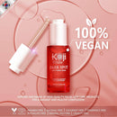 Eine rosafarbene Werbung zeigt eine rote Flasche „Koji White Dark Spot Brightening Serum“ mit einer Pipette. Der Text hebt „100 % vegan“ hervor und nennt Vorteile wie die Freiheit von Parabenen und Tierversuchen sowie die Förderung reiner Haut.