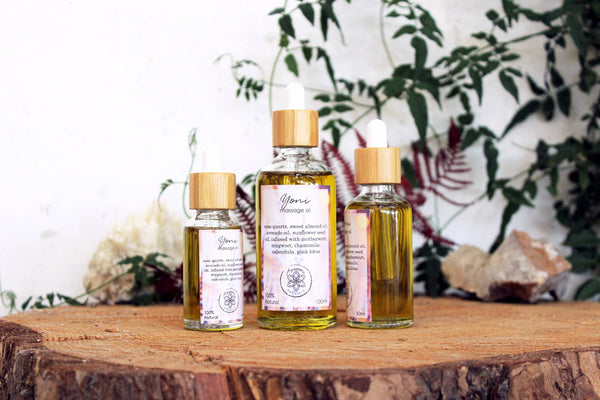 Yoni massage oil with rose quartz and herbs