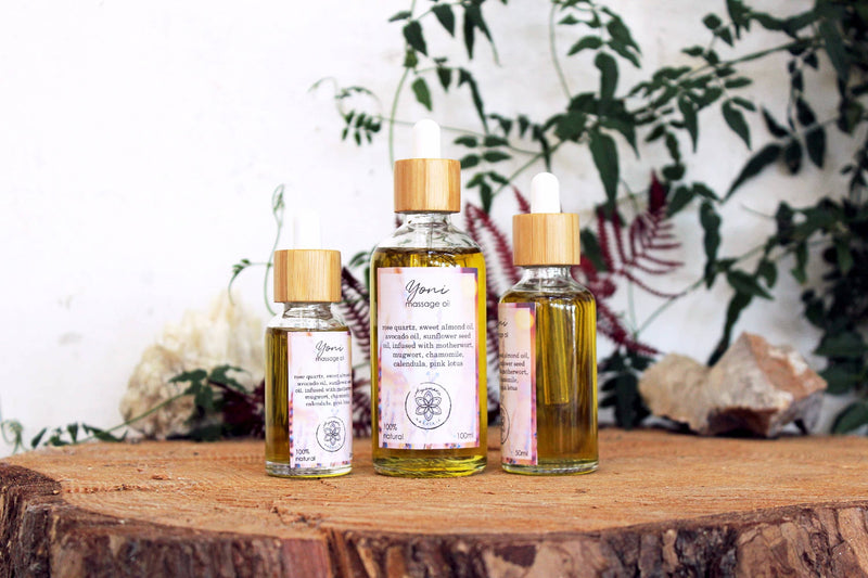 Yoni massage oil with rose quartz and herbs