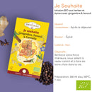 Werbebild für Shoti Maa „Je Souhaite“ (Ingwer, Fenchel & Zimt) Tee mit Produktinformationen auf Französisch.