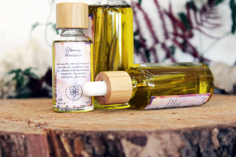 Yoni massage oil with rose quartz and herbs