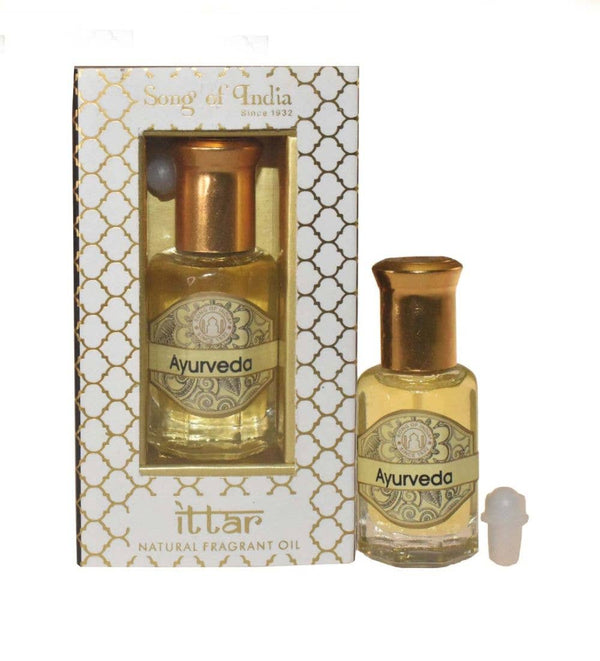 Flasche Ayurveda Ittār natürliches Duftöl in einer gold-weißen Schachtel.