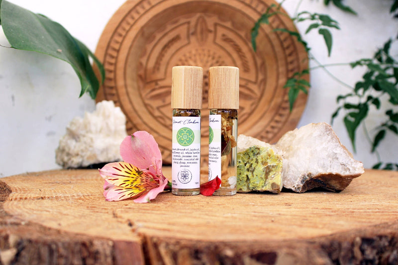 Heart chakra oil with crystals, herbs and essential oils