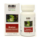 Eine weiße Schachtel und eine weiße Plastikflasche mit NIMI AYURVEDA Brahmi-Kapseln. Das Etikett zeigt eine Brahmi-Pflanze, den Inhalt von 60 Kapseln und das Gewicht von 35,8 g.