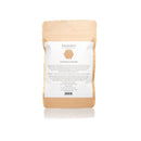 Rückseite einer braunen Tüte PAAVANI AYURVEDA ZUNGENREINIGER mit Produktinformationen und Gebrauchsanweisung.