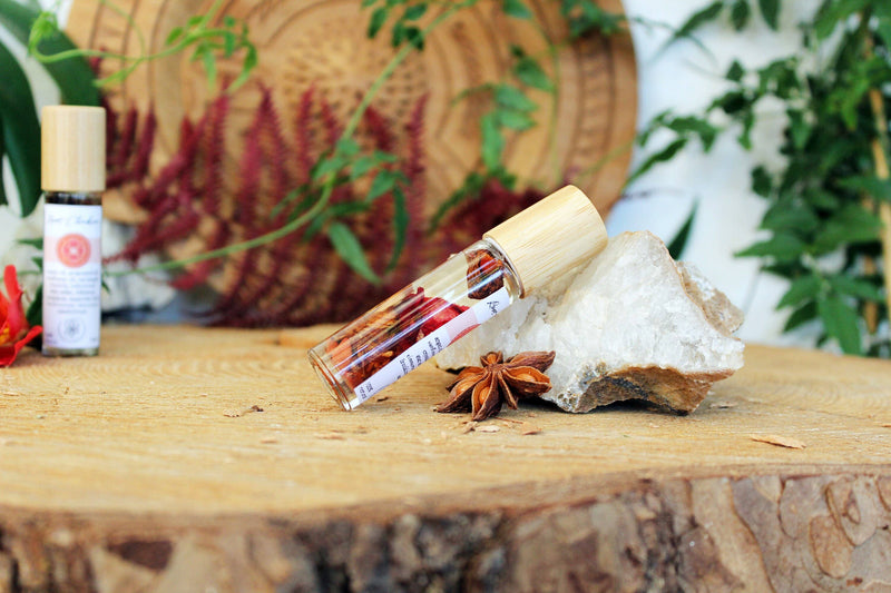 Balancing Root Chakra Oil with Herbs and Crystals