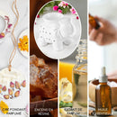 Weiße Keramik-Duftlampe "Tandor Blanc" in Elefantenform mit Produktmerkmalen auf Marmor und lila Blumen.