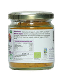 Eine Nahaufnahme des Etiketts eines kleinen Glasgefäßes mit Bio-Kurkumapulver (Cúrcuma longa) von Ayurveda. Das Etikett enthält die spanischen Inhaltsstoffe (100% ökologisches Kurkumapulver), Gebrauchsanweisungen und eine Nährwerttabelle pro 100g mit 301Kcal sowie das EU-Bio-Siegel.